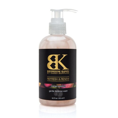 An image of Refresh and Renew gentle intimate wash in a squat bottle with a pump cap. The label reads Mango Passion on a strip with images of mangoes.